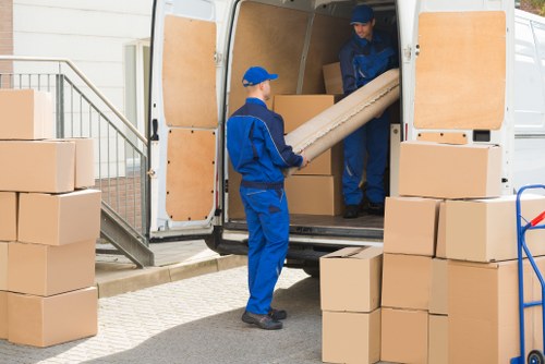 Removal team using safety equipment during a Finchley house move