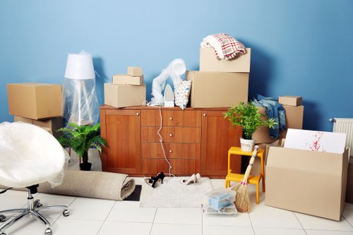 Removal team planning a local move in Finchley street setting
