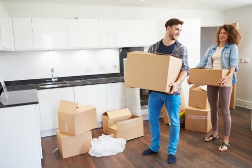 A moving team loading furniture for removals in Finchley
