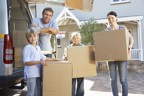 Professional moving team navigating Finchley street access