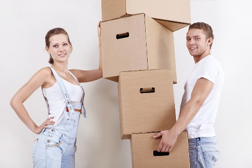 Packing and loading furniture into a moving truck in Finchley