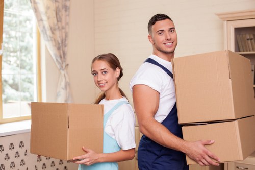 Packing and loading items into a van for a Finchley move