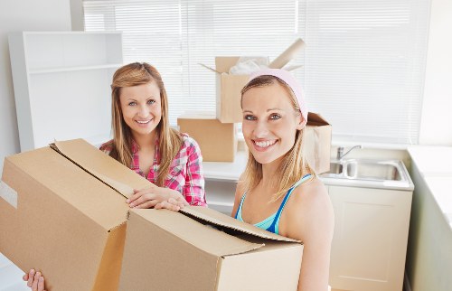 Preparing boxes and furniture for a Finchley moving truck